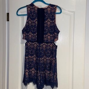 Navy lace romper with cut out